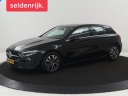 mercedes-aklasse-180-business-line-half-leder-stoelverwarming-adaptive-cruise-camera-park-assist-carplay-climate-control-navigatie-dab