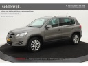 volkswagen-tiguan-14-tsi-lees-advertentie-sport&style-leder-climate-control-trekhaak