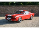 ford-mustang-fastback-289-restored-condition-in-the-color-scheme-ragoon-red-over-red-crinkle-vinyl